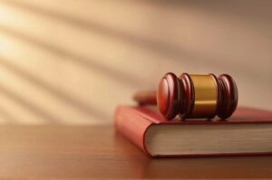 Wooden gavel on law book